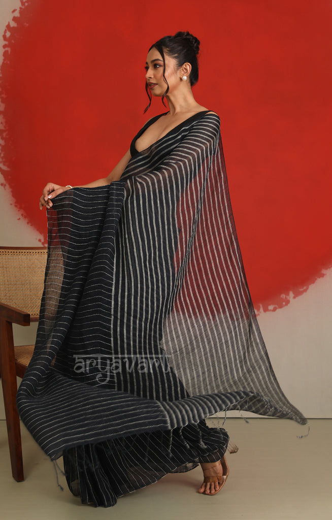 A striking Black & White Stripped Linen Saree