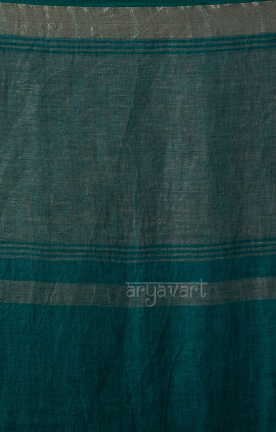 A stylish Teal & White Linen Saree