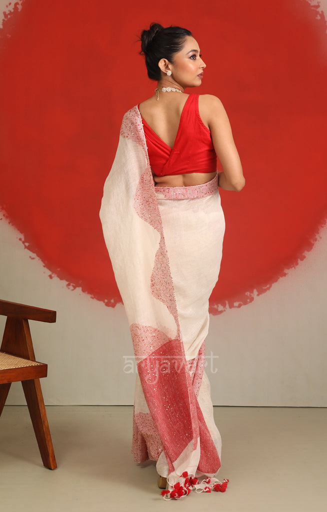 White Linen Saree with A Striking Red Border