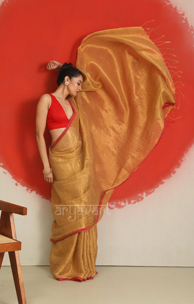 Gold Tissue Cotton saree With A Thin Red Border