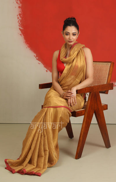 Gold Tissue Cotton saree With A Thin Red Border