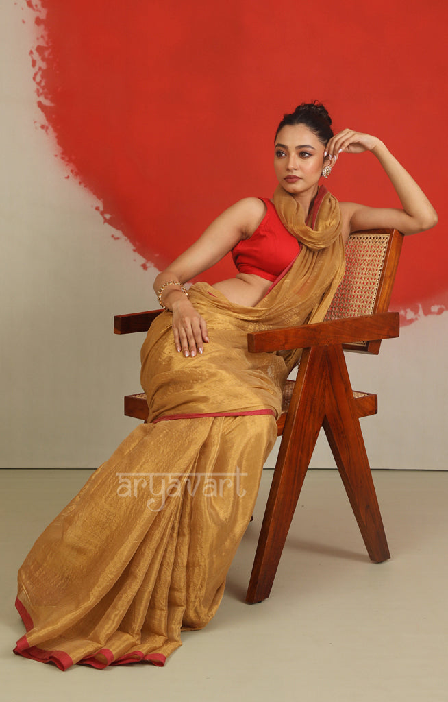 Gold Tissue Cotton saree With A Thin Red Border