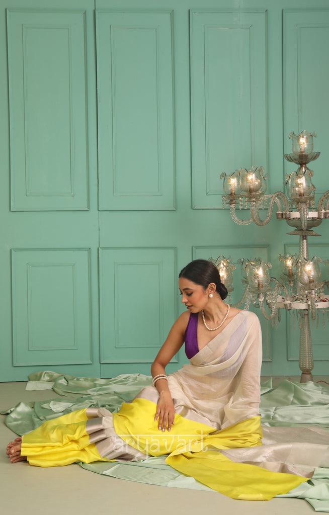 Pearl White Chanderi Saree with a striking Yellow Border