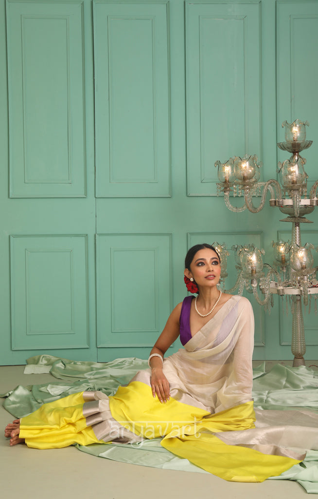 Pearl White Chanderi Saree with a striking Yellow Border