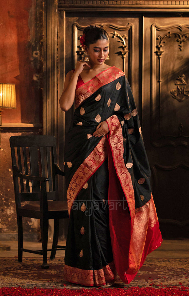 Stunning Black Katan Silk Saree With A Red Border & Gold Buttas