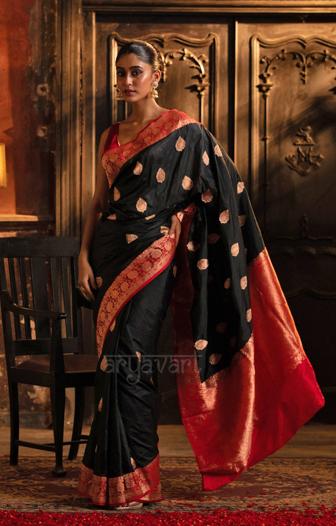 Stunning Black Katan Silk Saree With A Red Border & Gold Buttas