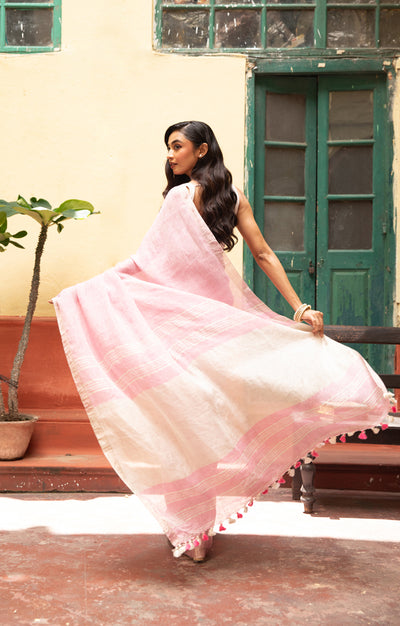 Blush Pink Linen Saree With A Delicate Silver Zari Border