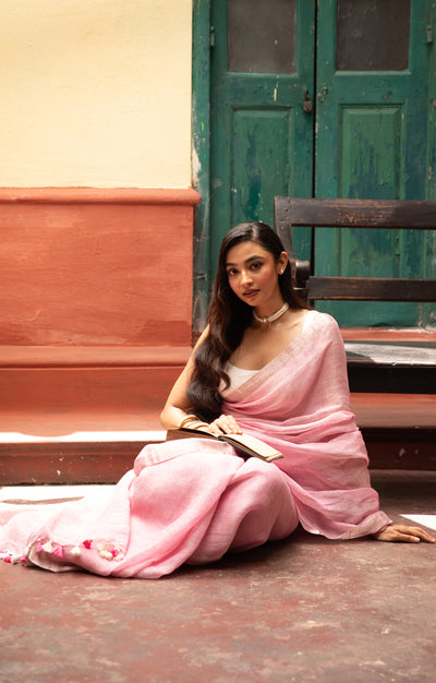 Blush Pink Linen Saree With A Delicate Silver Zari Border
