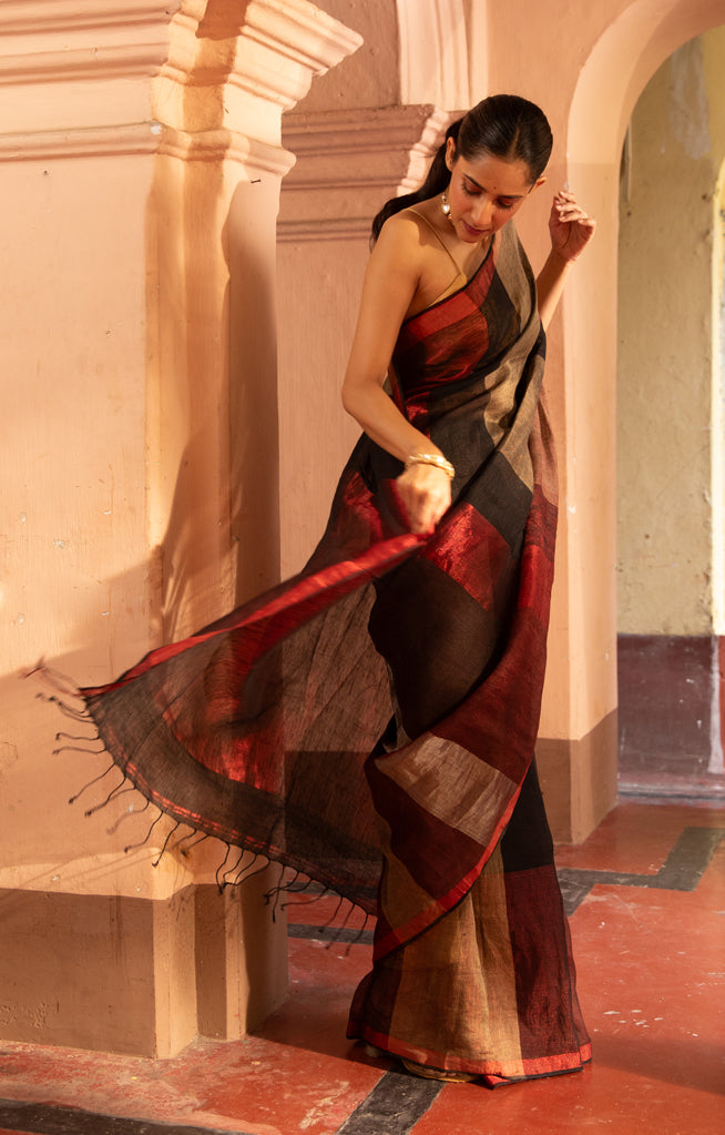 A stunning Red, Black and Beige Thick Vertical Striped Linen Saree