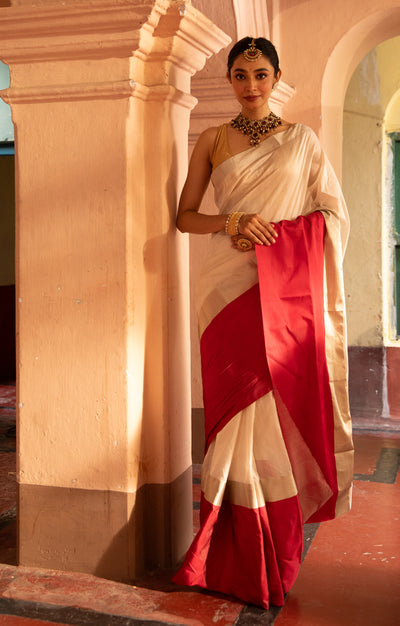 Pearl White Chanderi Saree with a striking Red Border