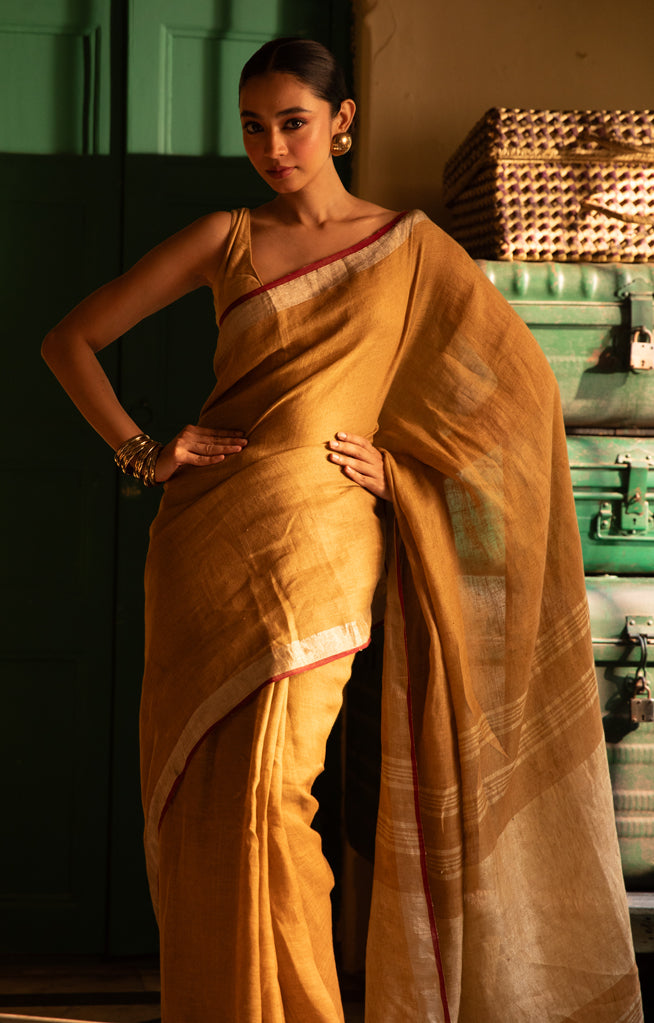 Goldenrod Yellow Linen Saree With Multi Coloured Woven Border
