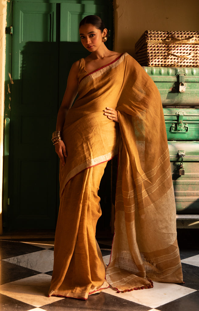 Goldenrod Yellow Linen Saree With Multi Coloured Woven Border