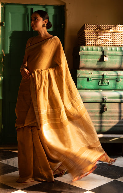 Goldenrod Yellow Linen Saree With Multi Coloured Woven Border
