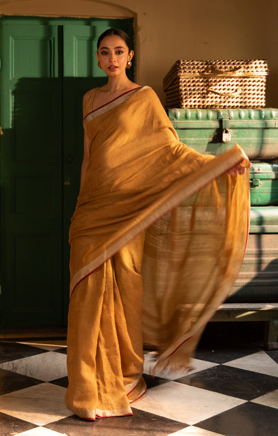 Goldenrod Yellow Linen Saree With Multi Coloured Woven Border