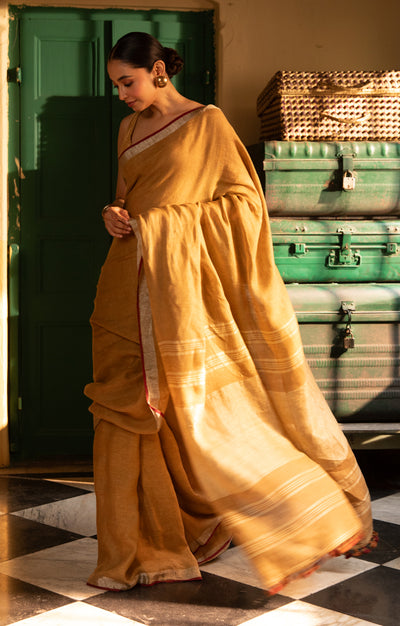 Goldenrod Yellow Linen Saree With Multi Coloured Woven Border