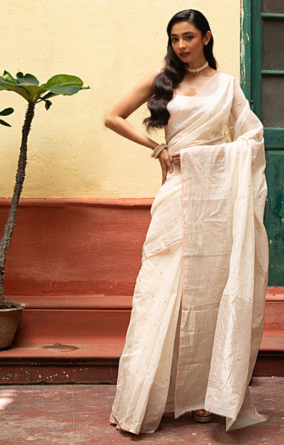 Ivory Chanderi Saree With Silver Buttas Along The Length of the Saree