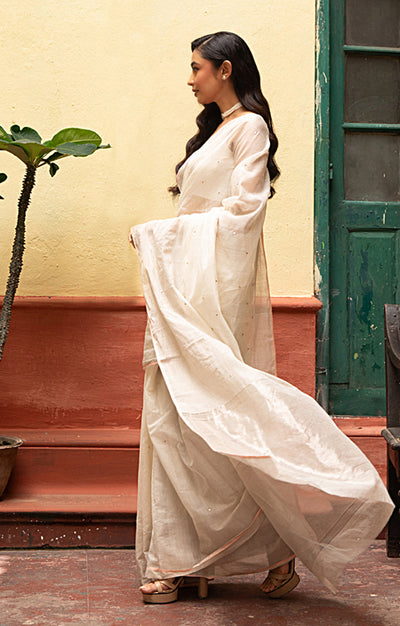 Ivory Chanderi Saree With Silver Buttas Along The Length of the Saree