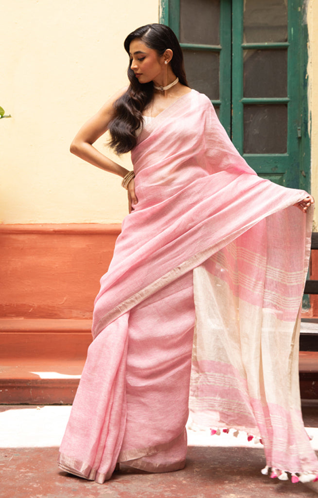 Blush Pink Linen Saree With A Delicate Silver Zari Border
