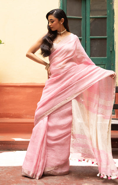 Blush Pink Linen Saree With A Delicate Silver Zari Border
