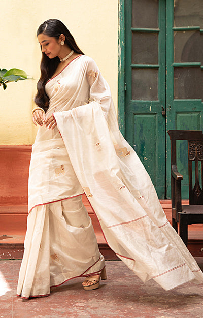 Ivory Chanderi Saree With Silver & Gold Cow Buttas Along The Length of the Saree