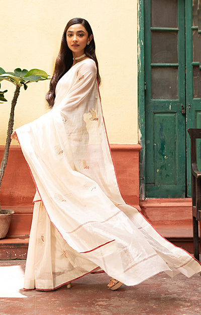 Ivory Chanderi Saree With Silver & Gold Cow Buttas Along The Length of the Saree