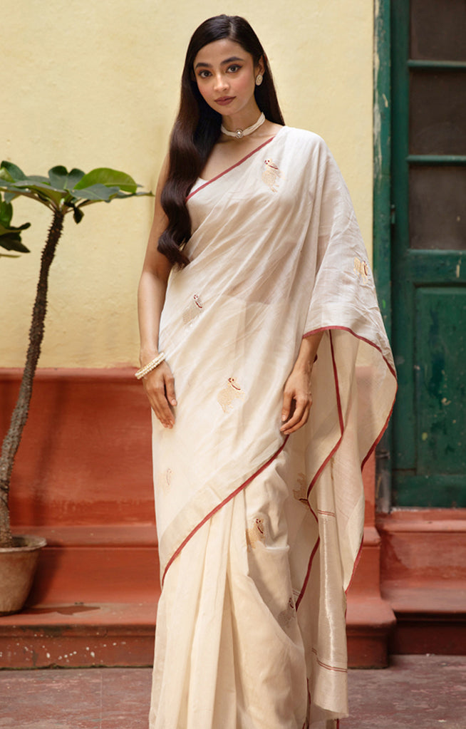 Ivory Chanderi Saree With Silver & Gold Cow Buttas Along The Length of the Saree
