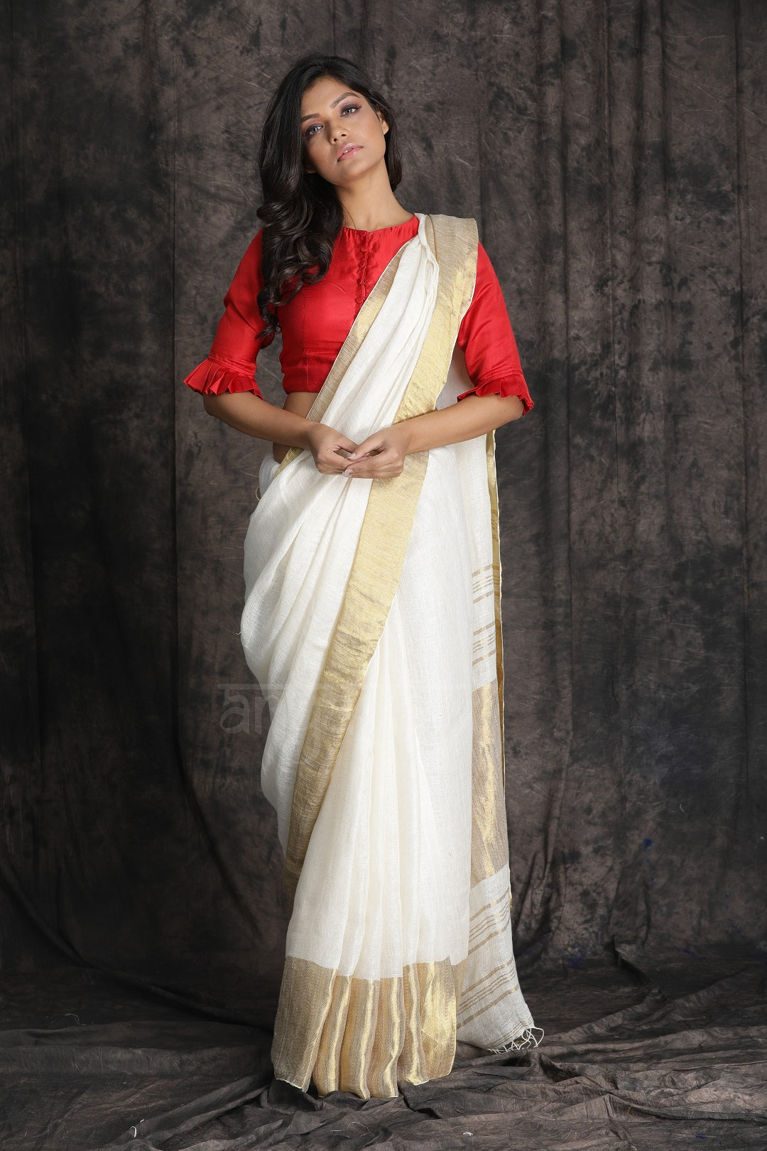 Off-White textured Organic Linen saree with gold Border