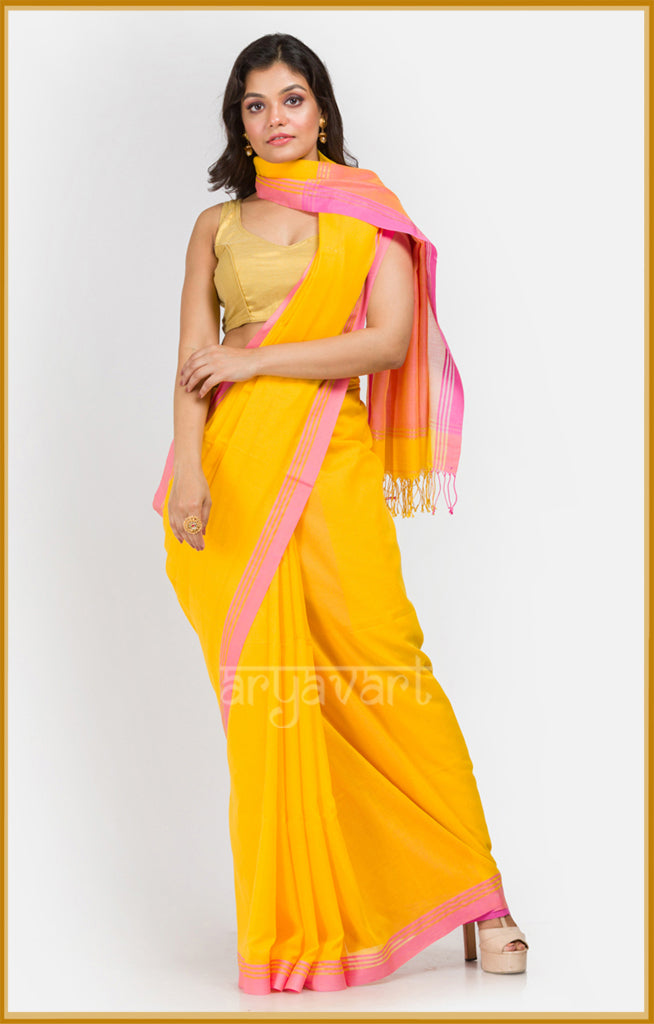 Yellow pure cotton saree with contrasting pink border