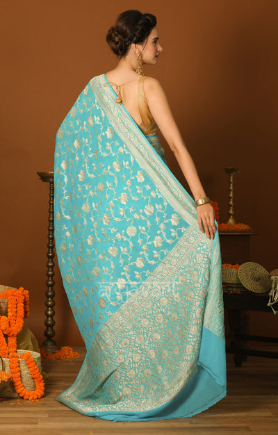 Turquoise Blue Chiffon Saree with Silver Zari Floral Weave