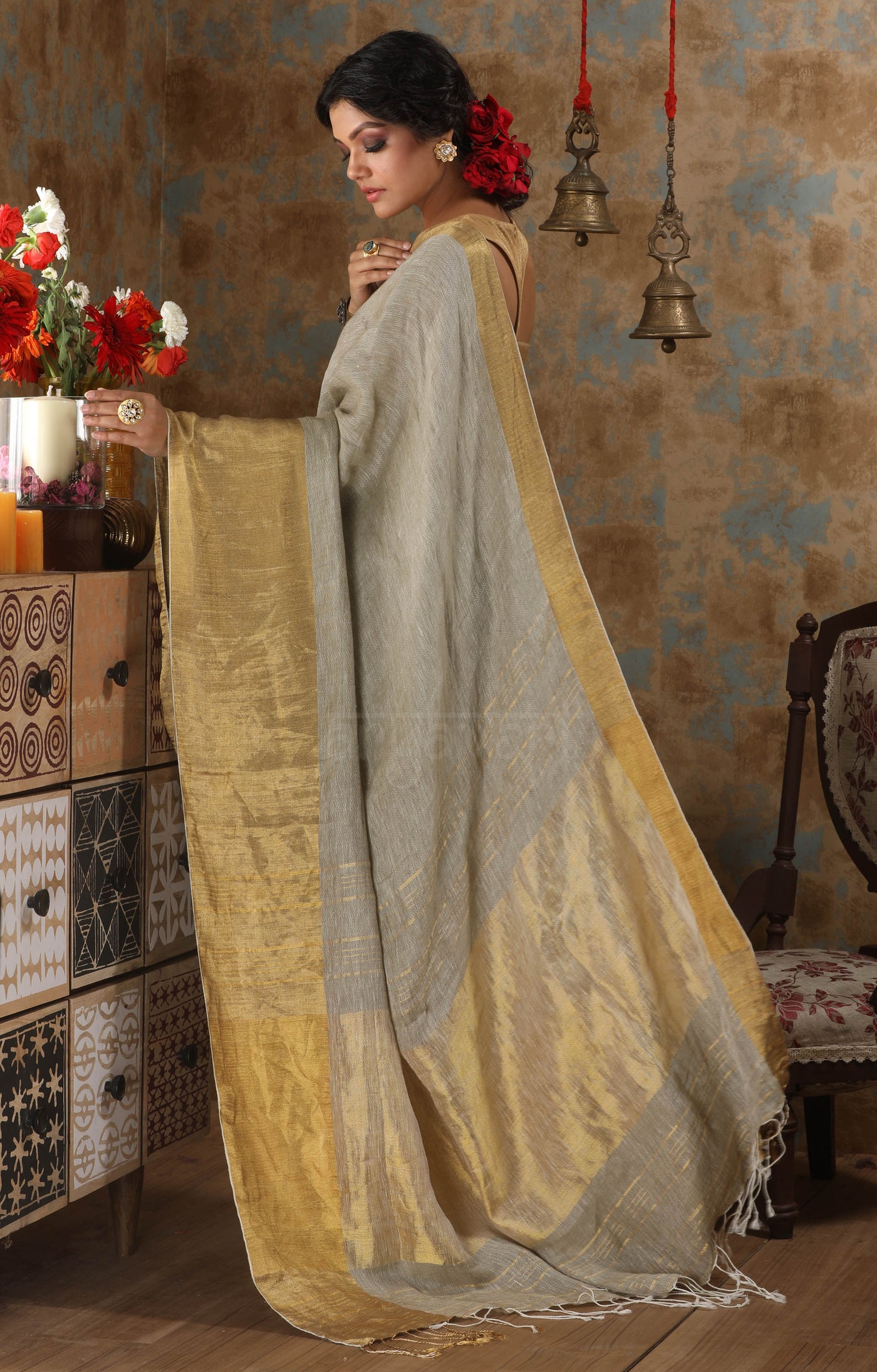 Sage Green Organic Textured Linen Saree With a striking Gold Zari Border & Pallu